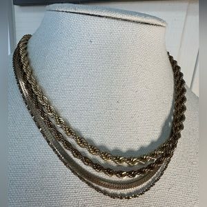 Four vintage goldtone chain necklacess